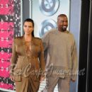 TV Personality Kim Kardashian and Rapper Kanye West