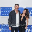 Olympic Gold Medalist Michael Phelps and Nicole Johnson