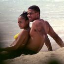Ashanti and Nelly relaxing on the beach!