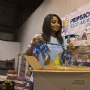 Raven Symone participates in PepsiCo Feeds America National Day of Service