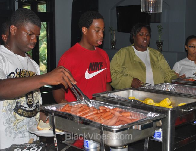 Kids Getting Something To Eat
