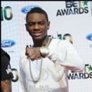 Soulja Boy shows the diamonds of his watch at the 2010 BET Awards