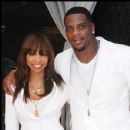 Actress Elise Neal and Host Clinton Portis