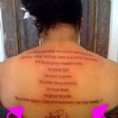 Chick gets The Roots' lyrics tattooed on her back
