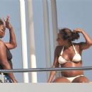 Alicia Keys and Queen Latifah off the coast of France