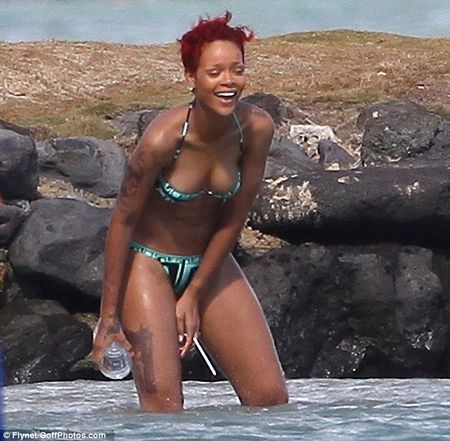 Have you seen Rihanna's new gun tattoo Don't worry it's temporary