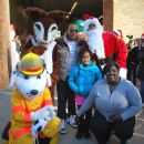 Ludacris with Sparky, Rudolph, Santa Claus, Chef Ashley, and his daughter, Karma 