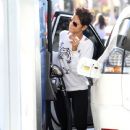 Yes, Halle Berry pumps her own gas