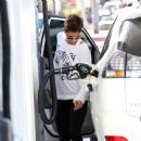 Yes, Halle Berry pumps her own gas