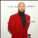 Kenny Burns attends Devyne Stephens' Annual Holiday Charity Event in Atlanta