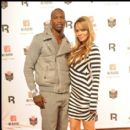 Chad OchoCinco and Evelyn attend the NFL Players Party