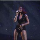 Rihanna gets down at her concert performance