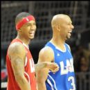 Trey Songz and Common share a laugh before game time