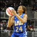 WNBA Star Tamika Catchings prepares to take a shot