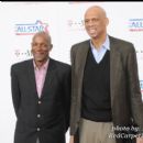 NBA Hall of Famers Clyde Drexler and Kareem Abdul Jabbar arrive to the game