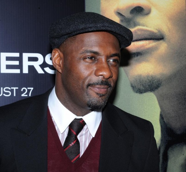 idris elba shirtless. images Idris Elba sat down for