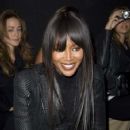 Naomi Campbell watches the Alexander McQueen show during Paris Fashion Week