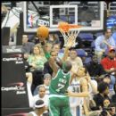 Celtics Jermaine O'Neal rises for the shot over JaVale McGee