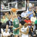 Troy Murphy gets a dunk for Boston