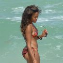 Angela Simmons enjoys some time on the beach in a bikini