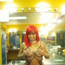Cubana Lust rockin the red hair and getting ready to perform