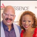 Tom Joyner and Wife Denise Richards on the red carpet before being honored