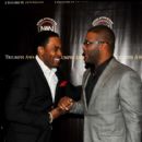Actor Lamman Rucker greets Honoree Tyler Perry on the red carpet for the 2011 Triumph Awards