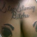 Ridiculous tattoo and the word they misspelled "staring"...smh