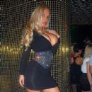 Coco looking sexy in a black dress