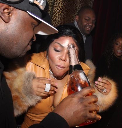 Funkmaster Flex serves Lil Kim a drink