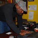 Big Dee getting songs ready on his laptop