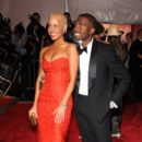 Kanye West and Amber Rose looking open casket sharp