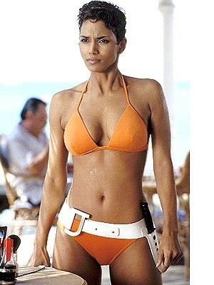 Halle Berry looks stunning in an orange bikini