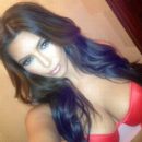 Kim Kardashian shows off her cleavage