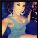 Diznee is wearing that skirt well!