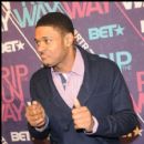 BET Rip the Runway Co-Host Pooch Hall does a little dance on the red carpet