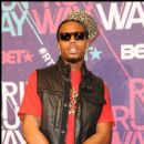 B.O.B. stops for pictures at BET Rip the Runway