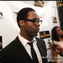 Actor Isaiah Washington talks to reporters before the screening