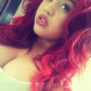 Weave-licious redhead boobs