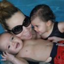 Mariah Carey takes a dip with her twins, Moroccan and Monroe