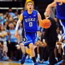Austin dribbling up court