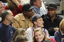 Actor Denzel Washington, right top, reacts as he watches University of Pennsylvania play Penn State during the second half of an NCAA college basketball game in State College, Pa., Friday, Nov. 13, 2009. (AP Photo/Carolyn Kaster)