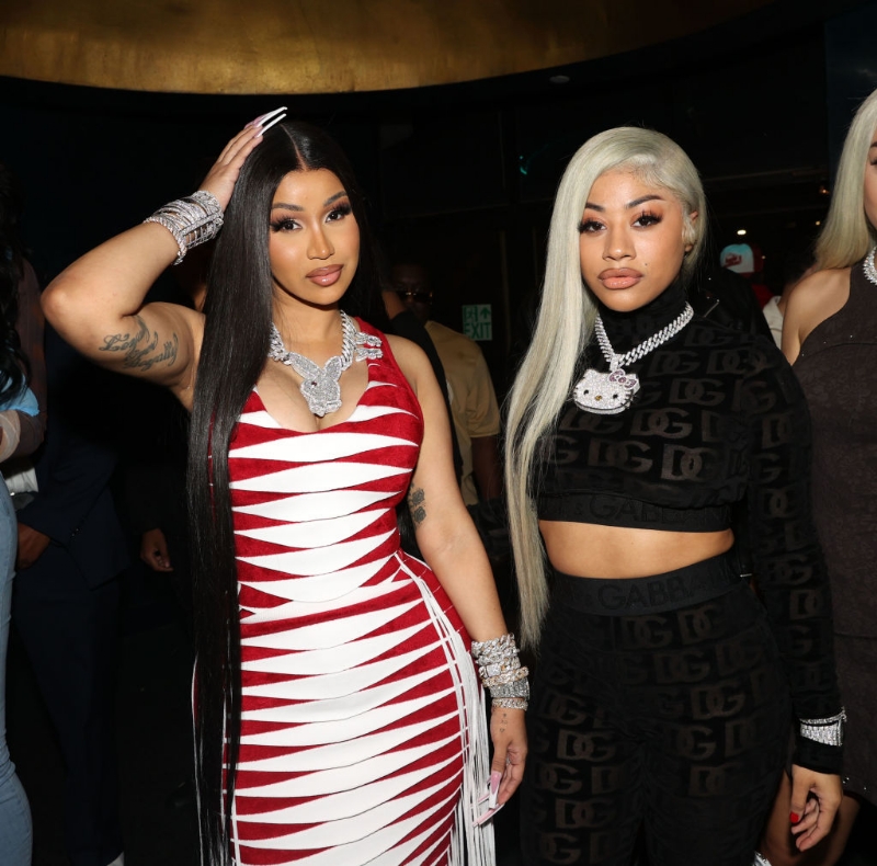Sisterly Sorcery Slander: Cardi B & Hennessy Carolina Clap Back At Twitter Trolls Sending Surgery Sh
