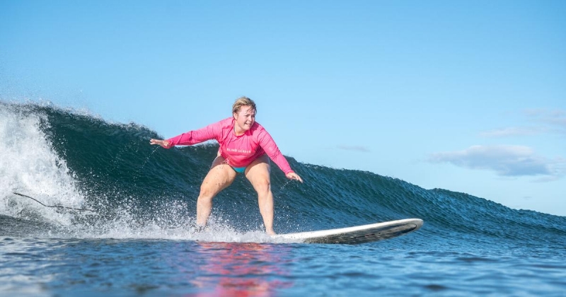 Oregonian adaptive surfer riding waves and breaking barriers