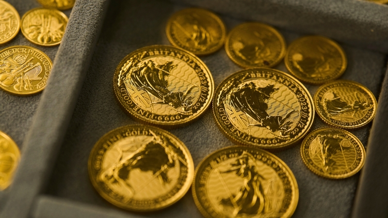 Gold futures rise above $4,000 per ounce for the 1st time reaching a record high