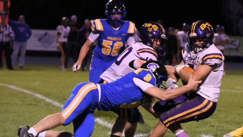 PHOTOS: Behind career day for Dopp, Madison races past Blissfield