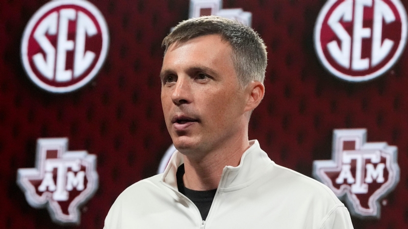 Here are the best photos from Texas A&M HC Bucky McMillan and two players at Media Days