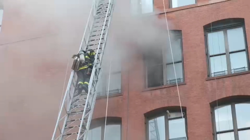 Fire crews race to control blaze at SoHo apartment building