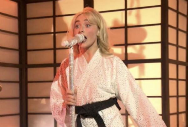 Sabrina Carpenter Dances In Underwear While Singing "Manchild," Drops F-Bomb ON SNL