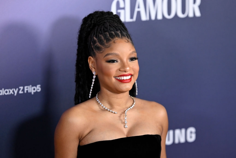 Halle Bailey Joins Oprah To Promote "The Color Purple," Fans Think She's Hiding Her Stomach